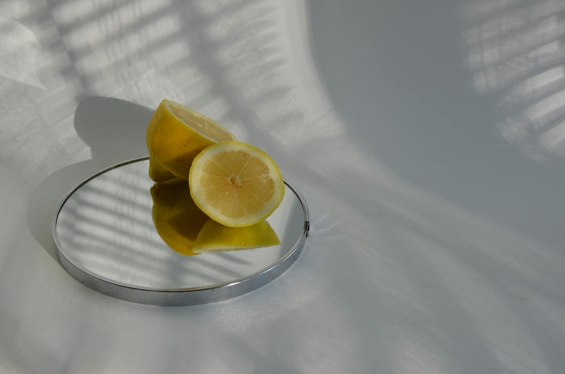 Ripe lemons on a bright yellow background, symbolizing fresh sensuality and natural pleasure