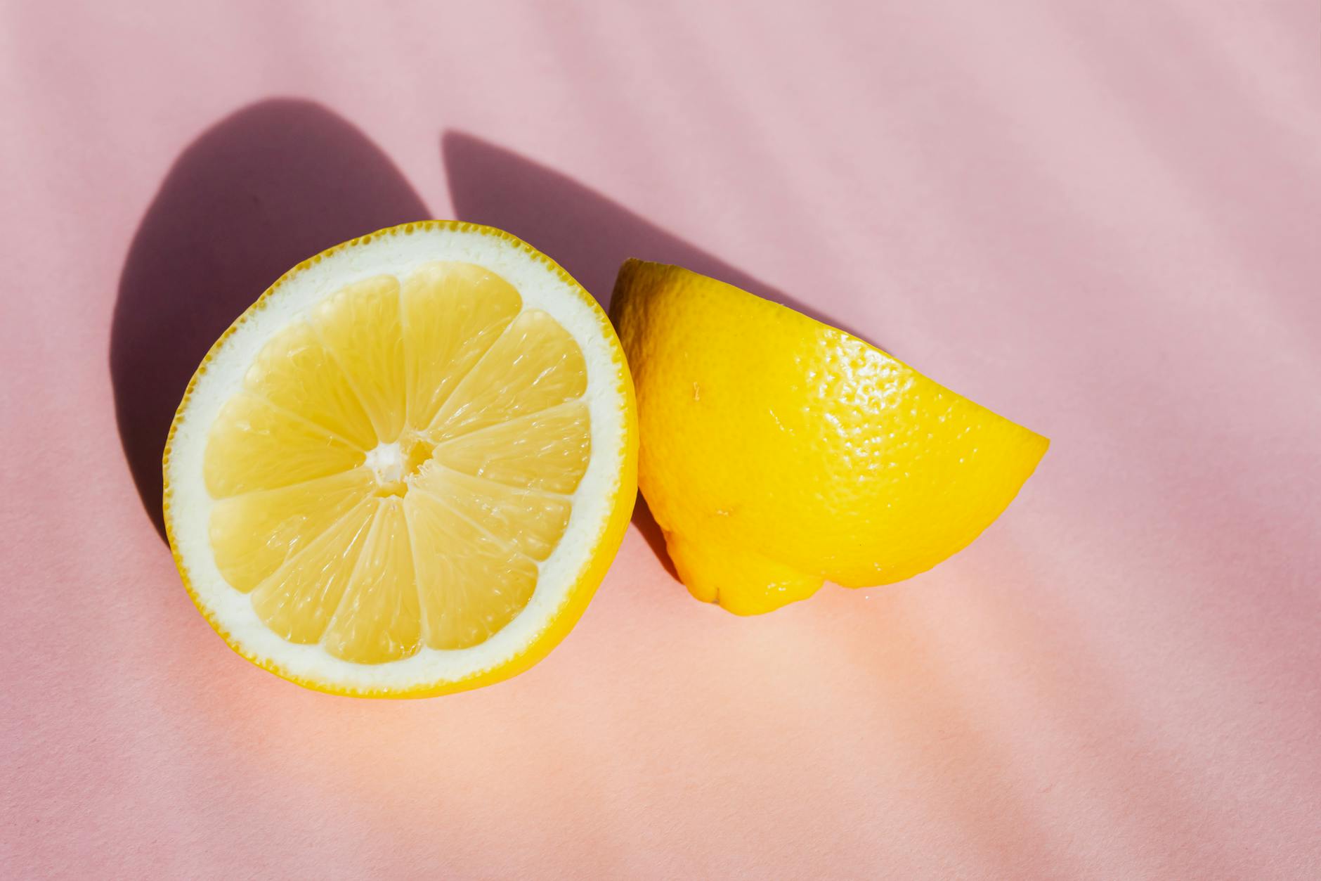 Woman holding lemon clitoral vibrators, exploring options for couples pleasure